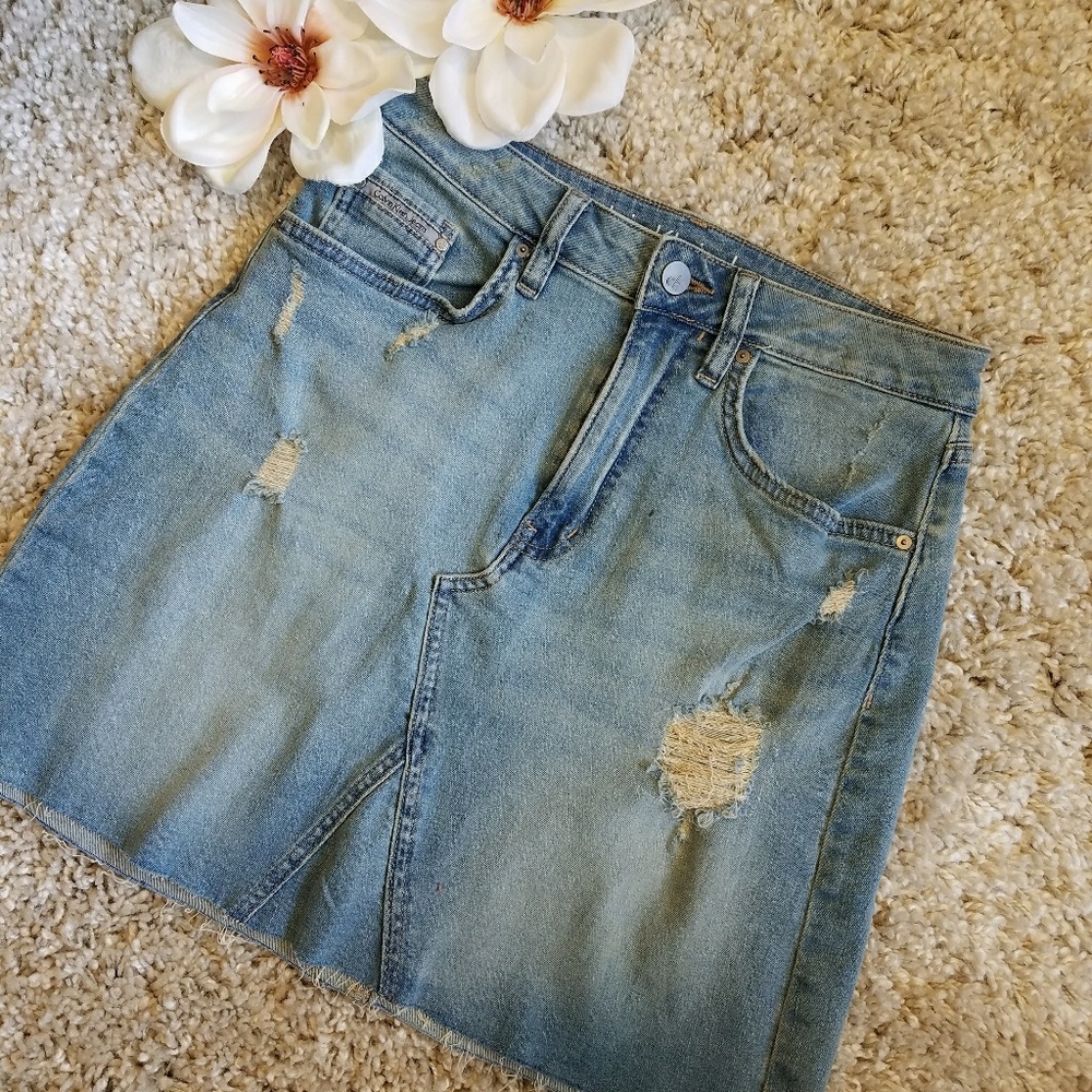 Calvin Klein distressed jean skirt
